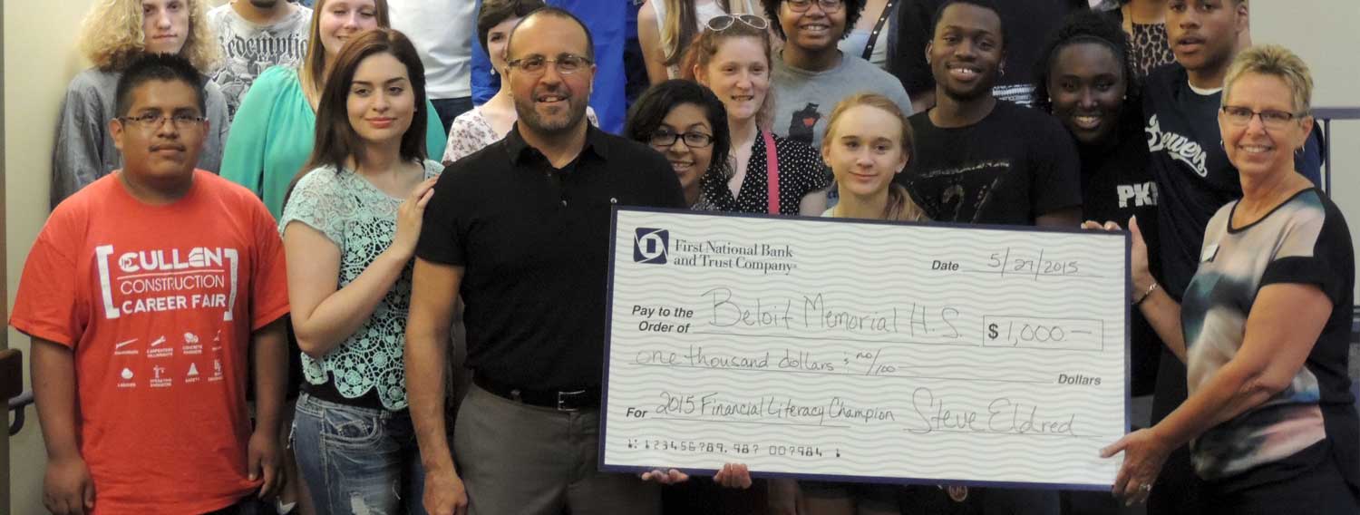 Beloit memorial high school students and teacher receive check from FNBT