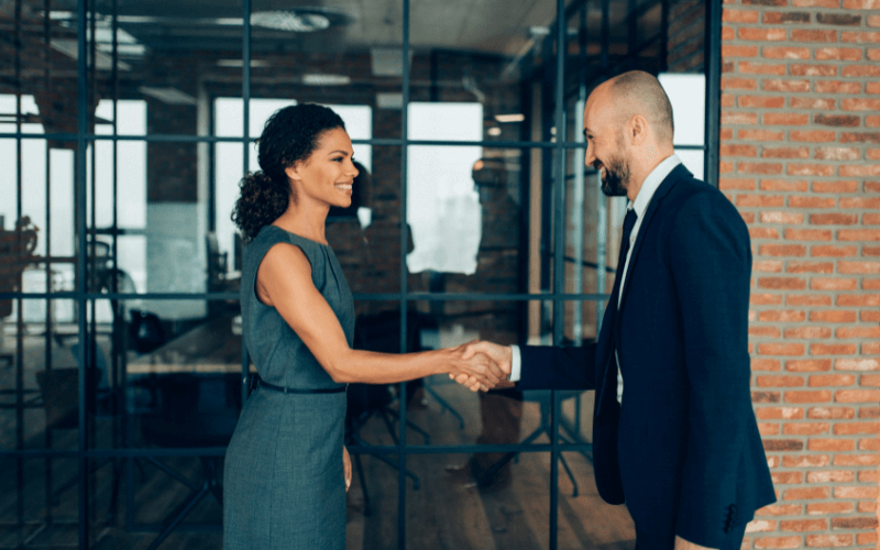 Two businesspeople shaking hands