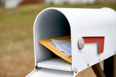 Open mailbox with pieces of mail