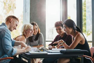 Group of college students studying