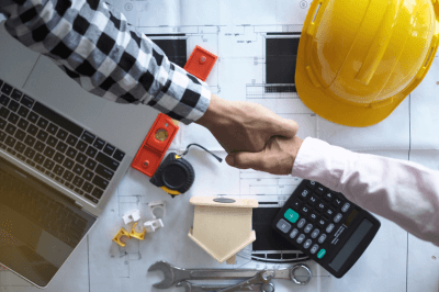 Business owner shaking the hand of his contractor