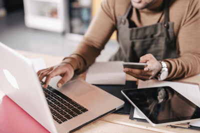 Business owners doing administrative work on their laptop