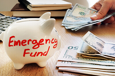 Piggy Bank with the words Emergency Fund written on it