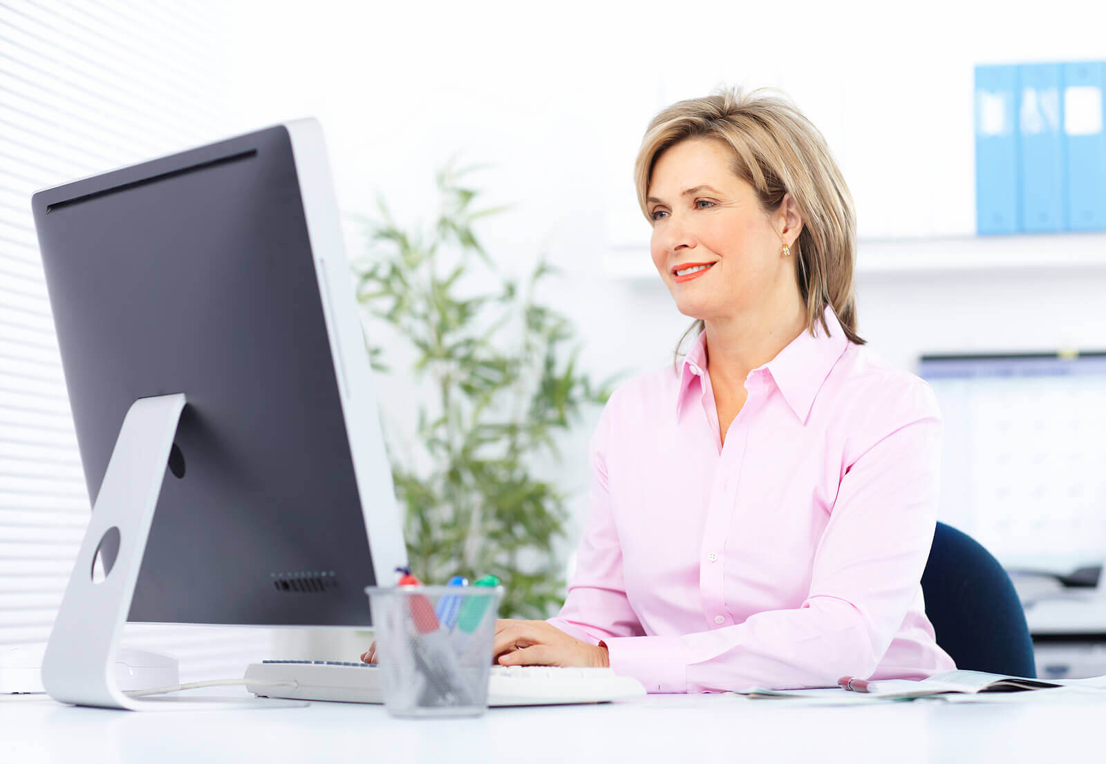 women using desktop computer