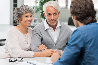 Senior couple meeting with a wealth manager