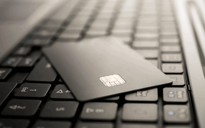 credit card laying on top of a keyboard